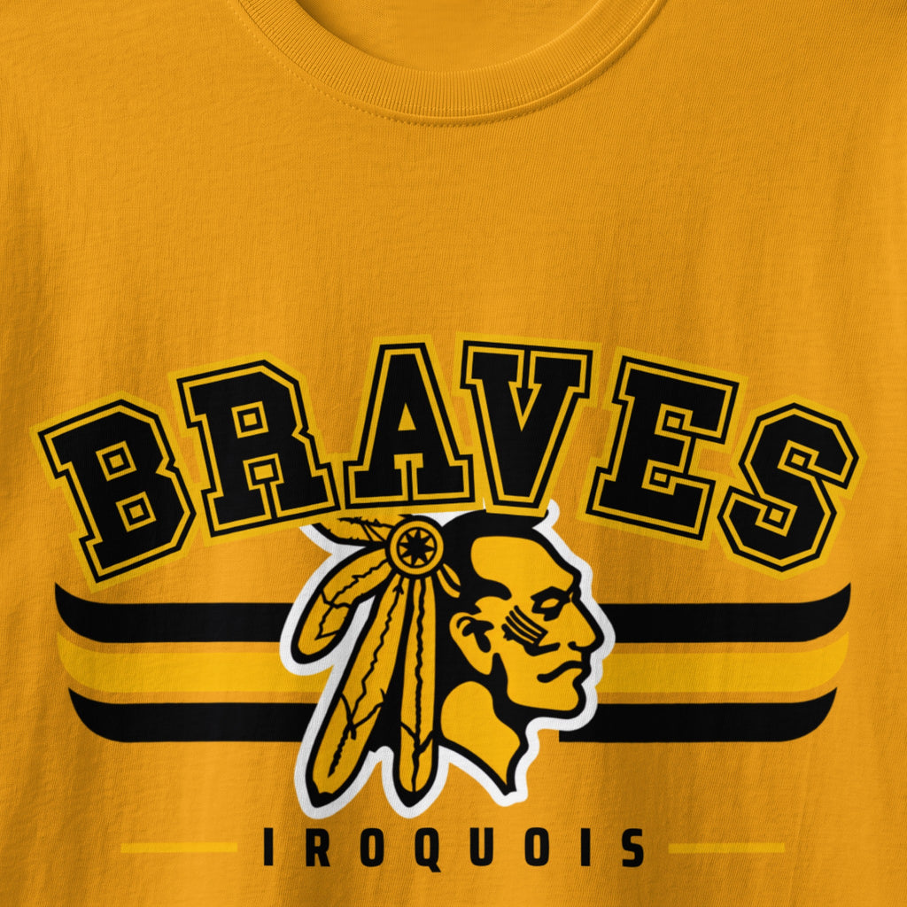 Braves Iroquois graphic with Native American profile and tribal patterns on gold shirt.
