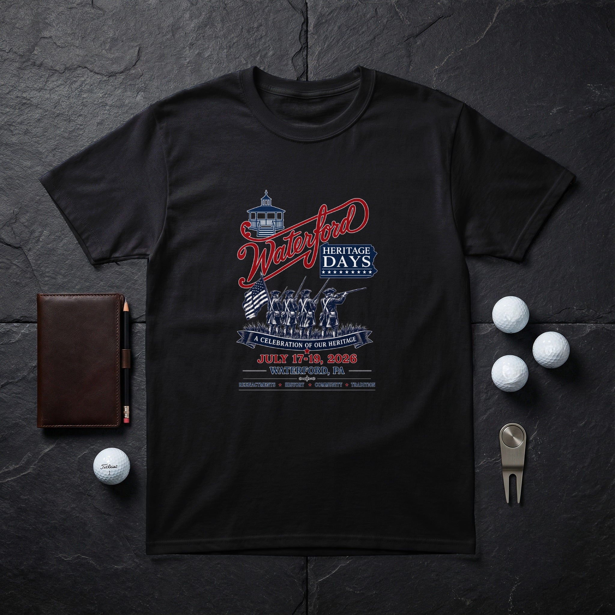 Black t-shirt with "Waterford Heritage Days July 17-19, 2026" graphic.
