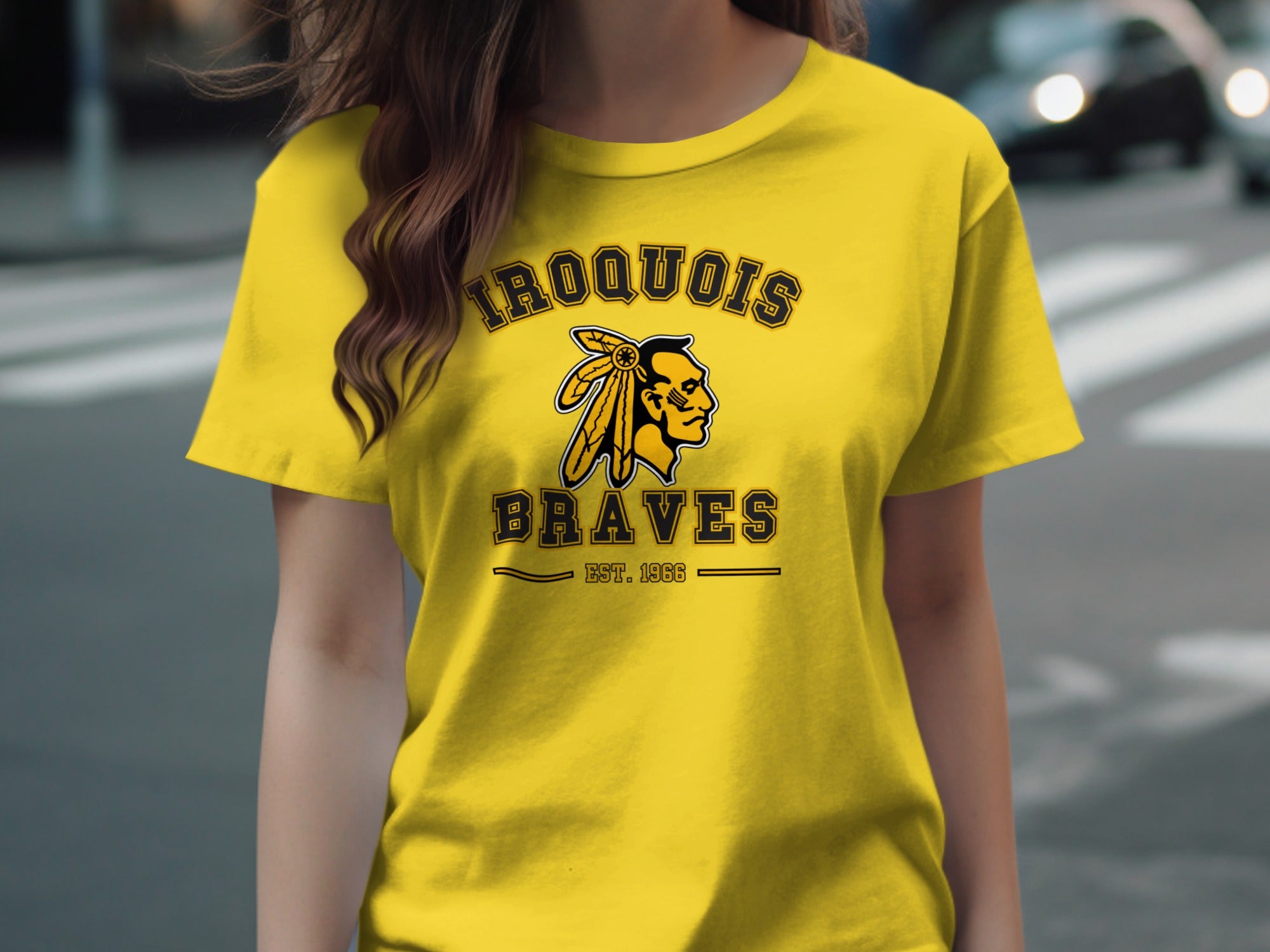 Yellow t-shirt with "IROQUOIS BRAVES EST. 1966" and a graphic of a Native American man.
