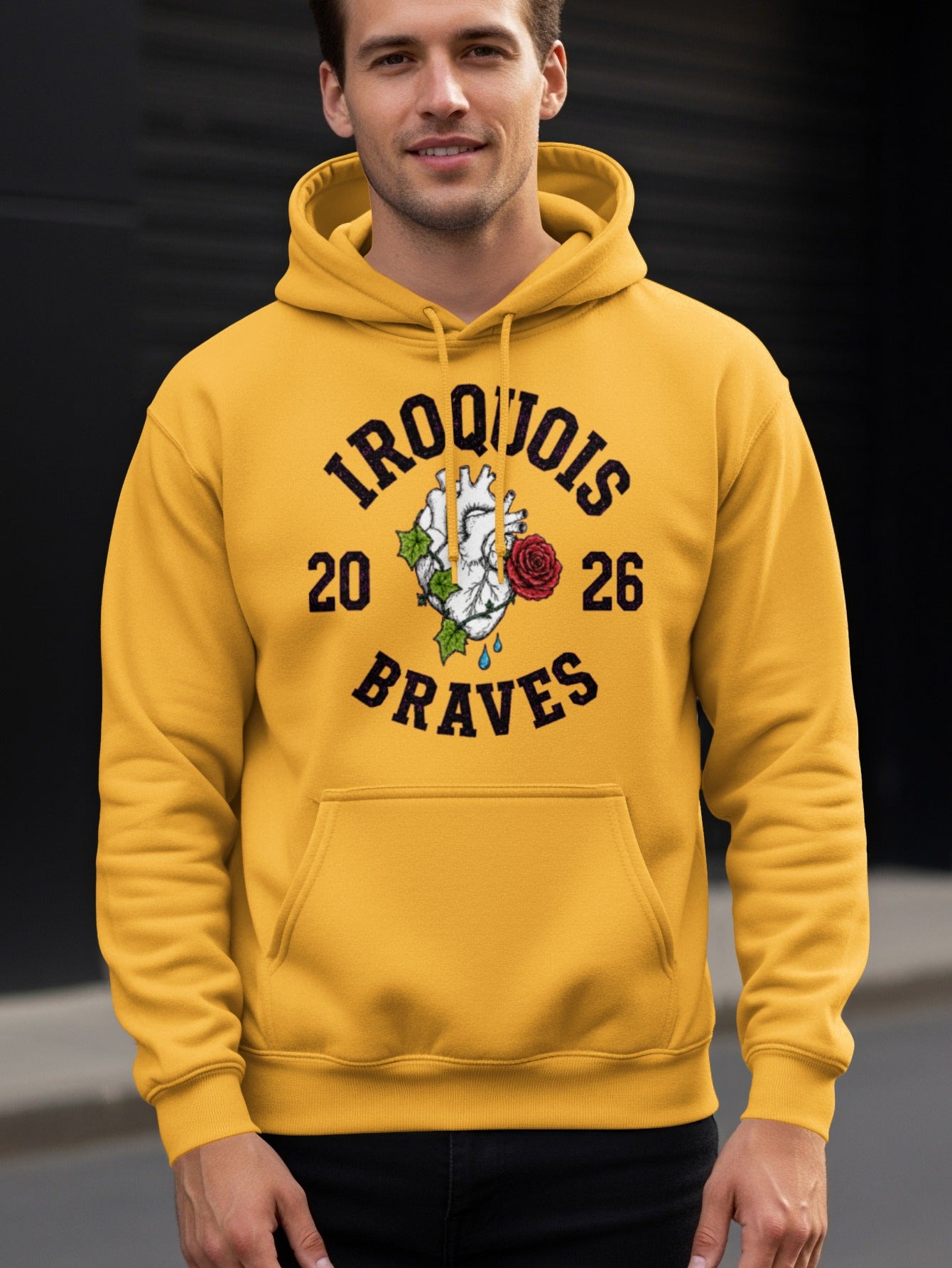 Yellow hoodie with "Iroquois 20-26 Braves" text and heart graphic.
