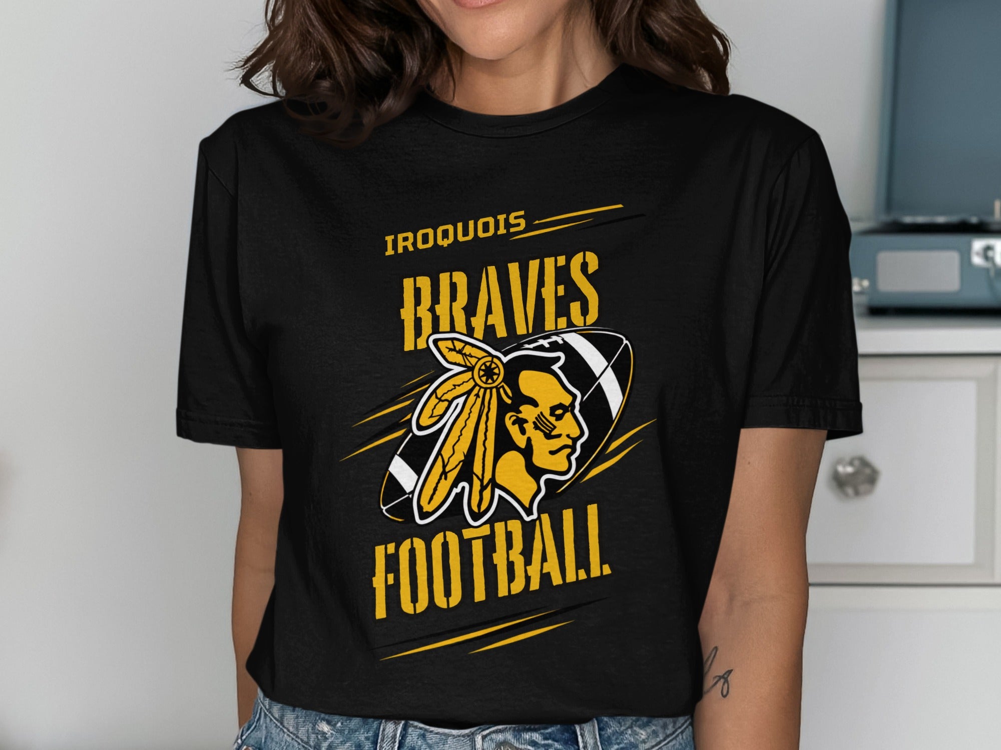 Black t-shirt with "Iroquois Braves Football" and a Native American chief graphic.