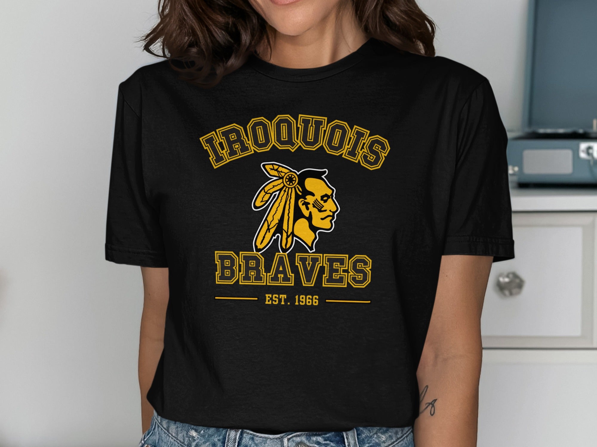 Black t-shirt with "Iroquois Braves Est. 1966" and Native American profile graphic.