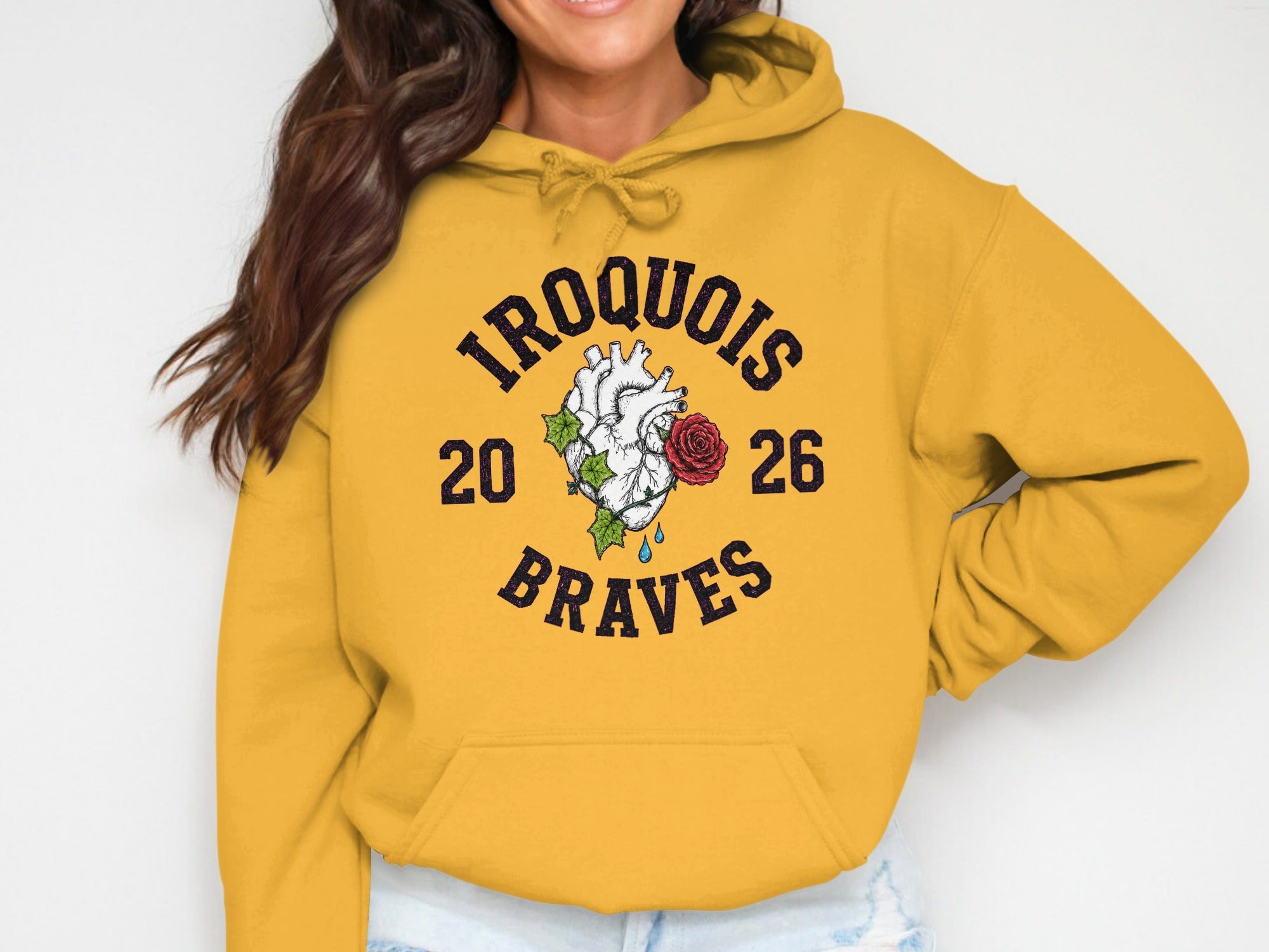 Yellow hoodie with Iroquois Braves design featuring a heart, rose, and years 20 and 26.