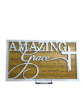 RJ Custom Works white and silver wood sign with "Amazing Grace" and a cross, over sheet music background.